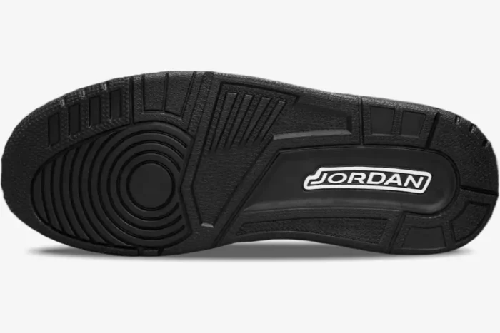 Bottom view of the black rubber outsole on an Air Jordan 3 Retro shoe. - SKU 136064-002