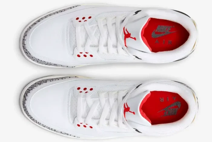 Top-down view of Air Jordan 3 Retro White Cement Reimagined sneakers in white and red. - SKU DN3707-100