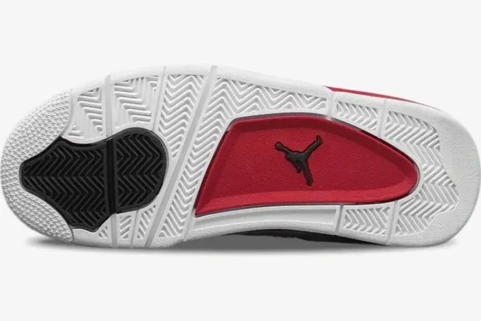 Outsole view of Air Jordan 4 Retro Alternate 89 in white, red, and black with Jumpman logo. - SKU 308497-106