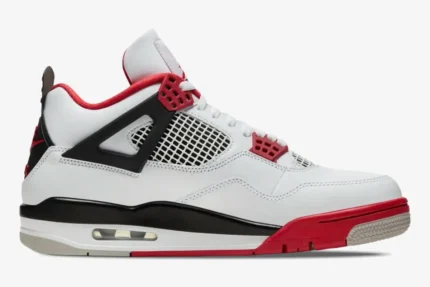 Side profile of Air Jordan 4 Retro Fire Red sneakers featuring white leather and black accents. - SKU DC7770-160