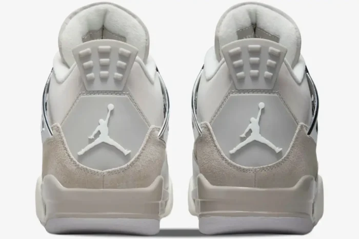 Back view of Air Jordan 4 Retro Frozen Moments women's sneakers in light grey and beige. - SKU AQ9129-001