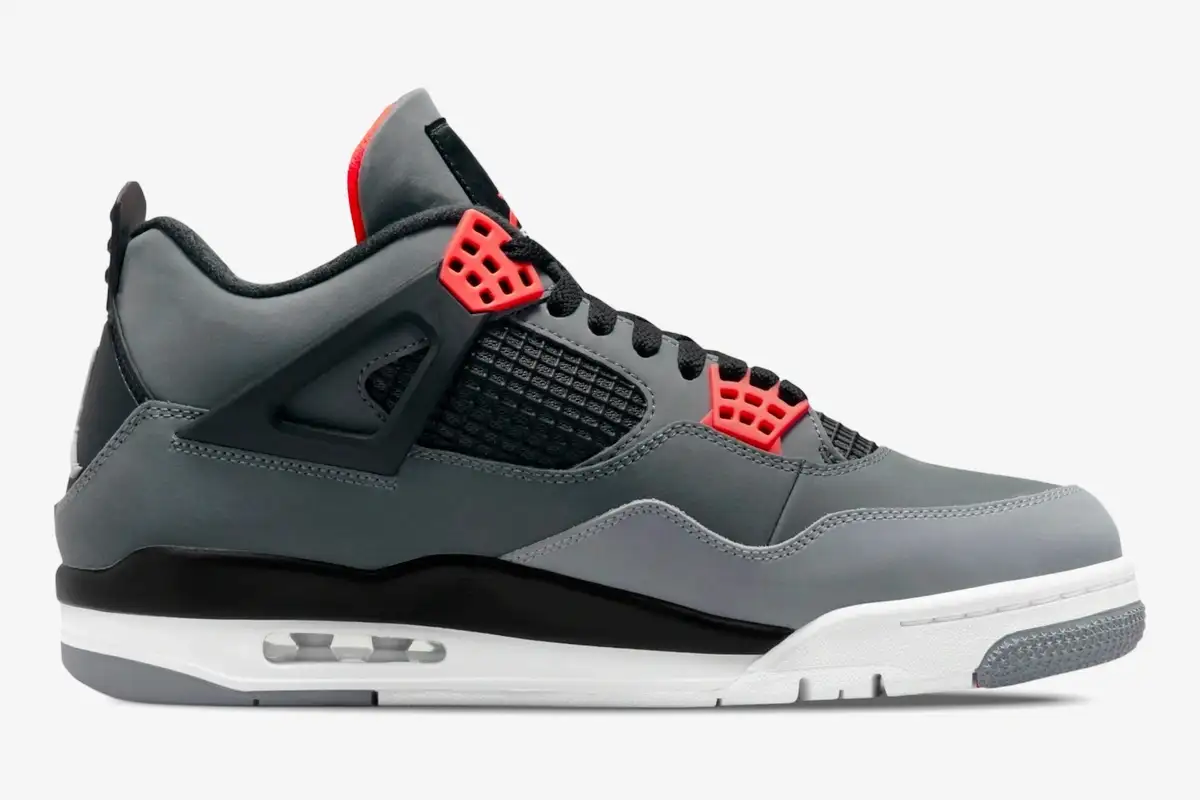 air-jordan-4-retro-infrared-grey-side-view-dh6927-061-213-050 Side profile of Air Jordan 4 Retro Infrared sneakers in dark grey with bright red accents and black details. - SKU DH6927-061