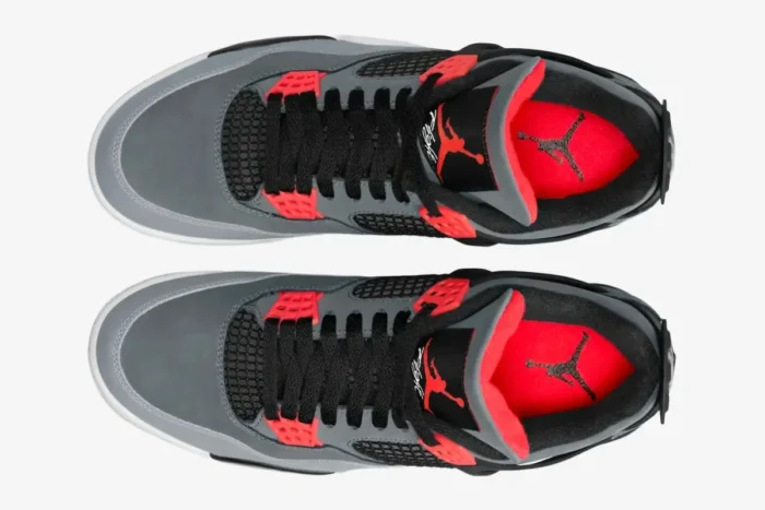 Top-down view of Air Jordan 4 Retro Infrared sneakers featuring grey nubuck upper, black laces, and infrared accents. - SKU DH6927-061