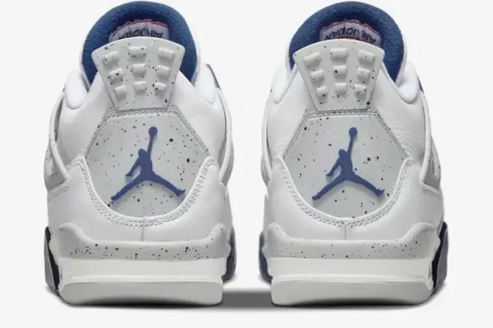 Rear view of Air Jordan 4 Retro Midnight Navy sneakers in white and grey with blue Jumpman logos. - SKU DH6927-140