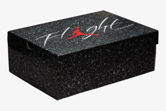 Air Jordan 4 Retro Military Black shoebox with speckled pattern and red Jumpman logo, angled view. - SKU DH6927-111