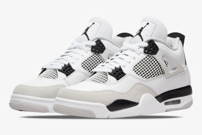 Air Jordan 4 Retro Military Black sneakers in white, black, and grey, three-quarter front view. - SKU DH6927-111
