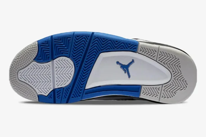 Bottom view of Air Jordan 4 Retro Motorsports outsole in blue, white, and grey. - SKU 308497-117