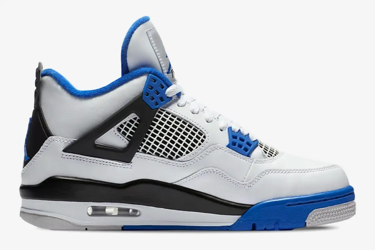 air-jordan-4-retro-motorsports-white-blue-side-308497-117-231-727 Side profile of white and blue Air Jordan 4 Retro Motorsports sneakers with black accents. - SKU 308497-117