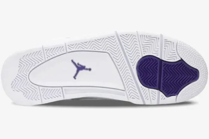 Outsole view of the Air Jordan 4 Retro Purple Metallic sneaker featuring white and purple traction patterns. - SKU CT8527-115