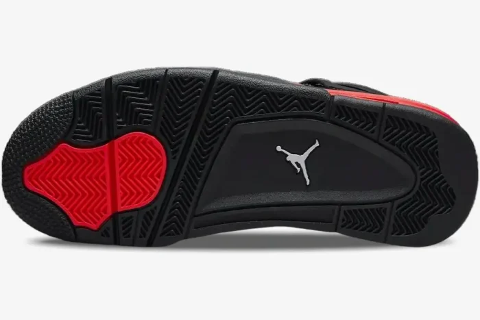 Bottom view of Air Jordan 4 Retro Red Thunder outsole in black and red with white Jumpman logo. - SKU CT8527-016