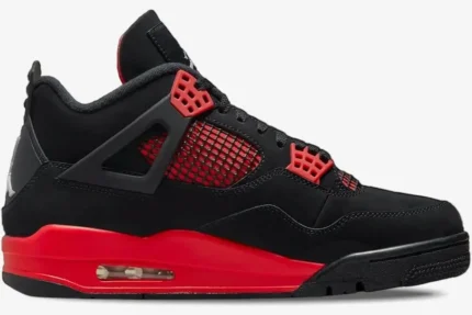 Side view of the Air Jordan 4 Retro Red Thunder shoe featuring a black upper and red accents. - SKU CT8527-016