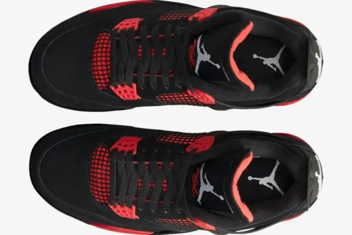 Top-down view of black and red Air Jordan 4 Retro Red Thunder sneakers showing the tongue and insoles. - SKU CT8527-016