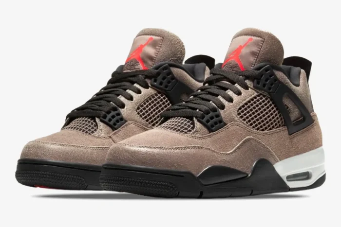 Three-quarter front view of Air Jordan 4 Retro Taupe Haze sneakers with cracked brown uppers and black accents. - SKU DB0732-200
