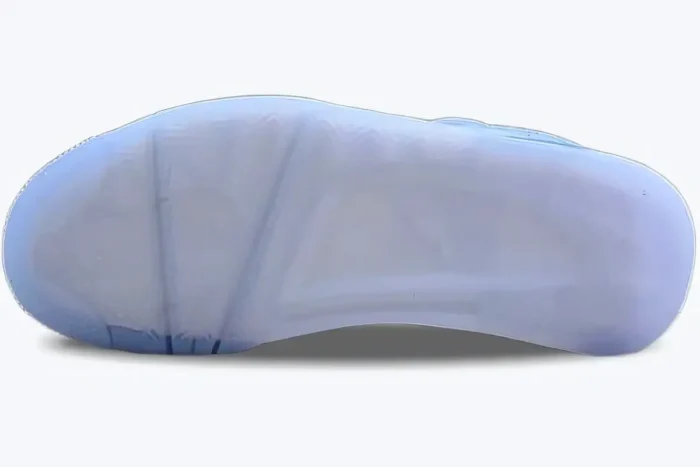 Bottom view of Air Jordan 4 Retro UNC PE showing its translucent blue rubber outsole. - SKU su18-mnjdls-731-lnm-aj4-904284