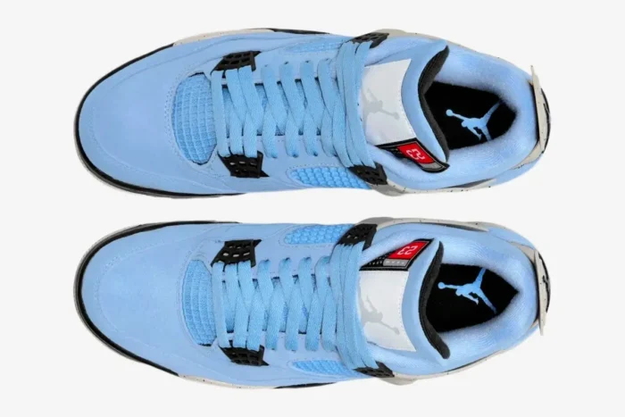 Top-down view of Air Jordan 4 Retro University Blue sneakers with light blue suede and black accents. - SKU CT8527-400