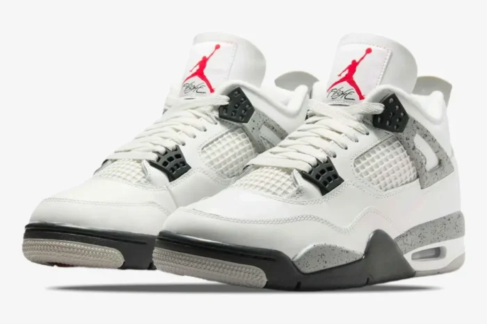 Air Jordan 4 Retro White Cement sneakers in a three-quarter front view on a white background. - SKU 840606-192