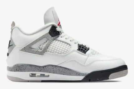 Side profile of Air Jordan 4 Retro White Cement sneakers featuring white leather and grey speckled accents. - SKU 840606-192