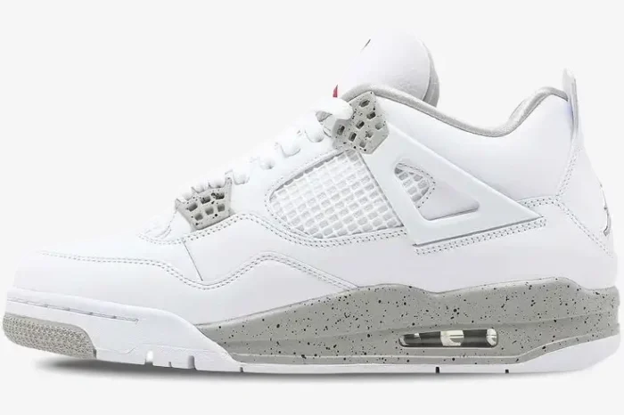 Side profile of Air Jordan 4 Retro White Oreo sneakers in white leather with grey speckled accents. - SKU CT8527-100