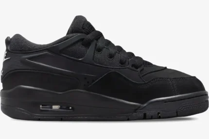 Side profile of the Air Jordan 4 RM Black Cat Remastered sneaker in all black. - SKU FQ7939-004