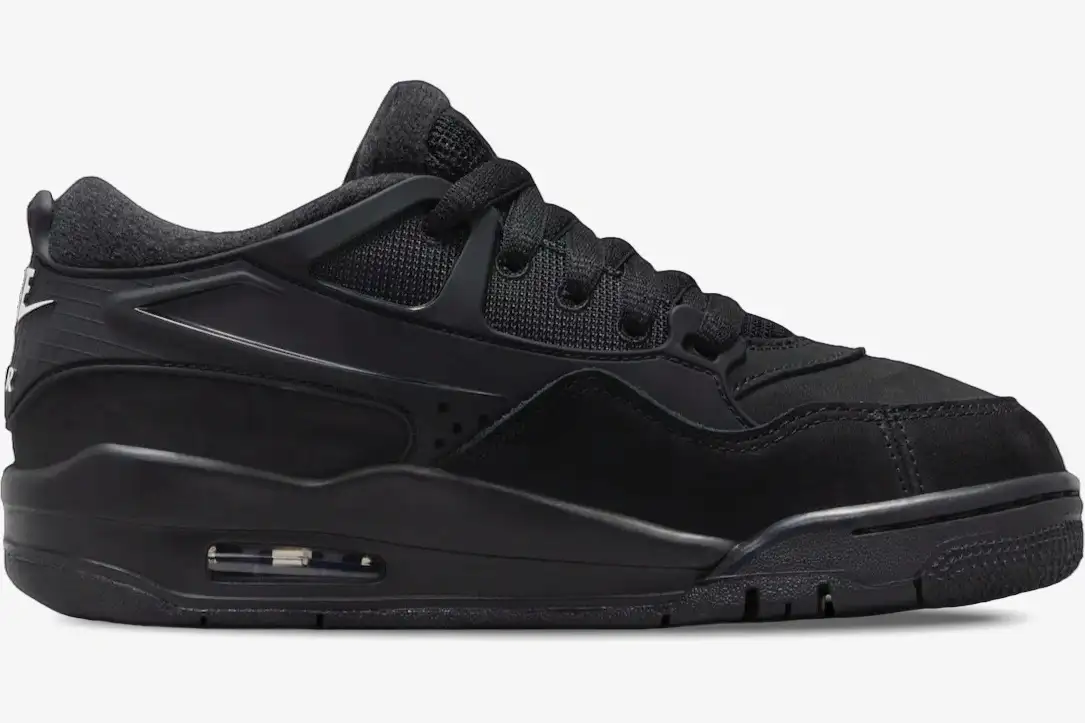 air-jordan-4-rm-black-cat-side-profile-fq7939-004-735-278 Side profile of the Air Jordan 4 RM Black Cat Remastered sneaker in all black. - SKU FQ7939-004
