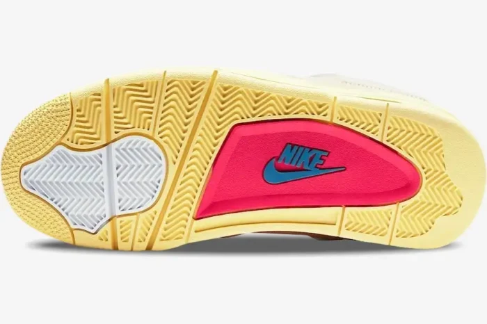 Bottom outsole view of Air Jordan 4 x Union LA Guava Ice sneaker in yellow, white, and pink. - SKU DC9533-800