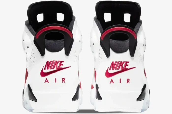 Rear view of white and red Air Jordan 6 Retro Carmine sneakers with Nike Air heel logo. - SKU CT8527-100