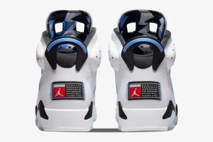Rear view of Air Jordan 6 Retro UNC sneakers in white and university blue with heel patches. - SKU CT8529-410