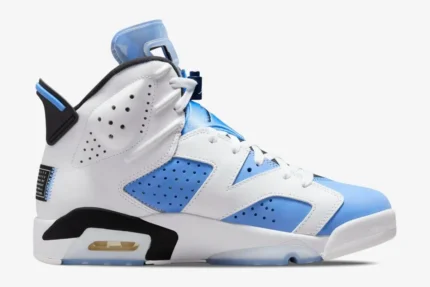 Side profile of Air Jordan 6 Retro UNC sneakers in white and university blue. - SKU CT8529-410