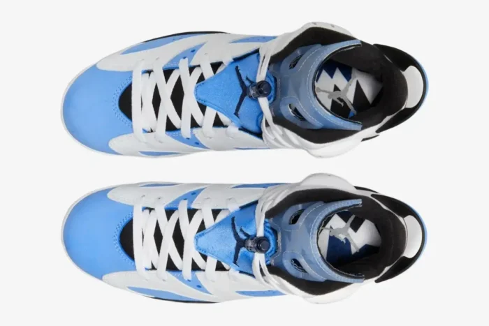 Top-down view of Air Jordan 6 Retro UNC sneakers in white and university blue with white laces. - SKU CT8529-410