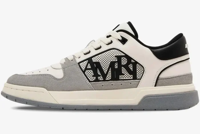 Side view of Amiri Classic Low luxury sneaker in white, grey, and black leather and suede. - SKU AMFOSR1067-001
