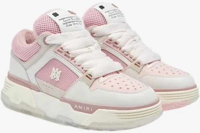 Three-quarter view of Amiri MA-1 sneakers in pink, alabaster, and white for women. - SKU AWFOSR1080-628