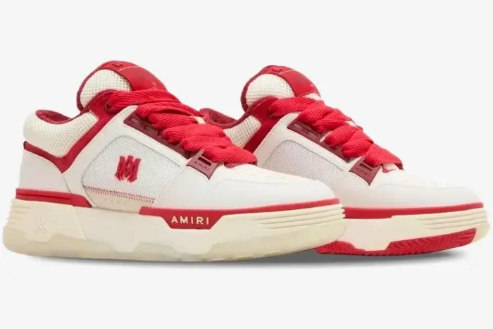 Amiri MA-1 sneakers in white and red, side view showing chunky sole and red logo on mesh panel. - SKU PS24MFS018-610