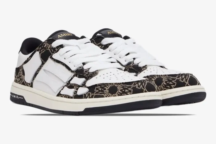 AMIRI MA Quad Skel Top Low black and white sneakers with bone appliqués, three-quarter view. - SKU AMFOSR1111-001