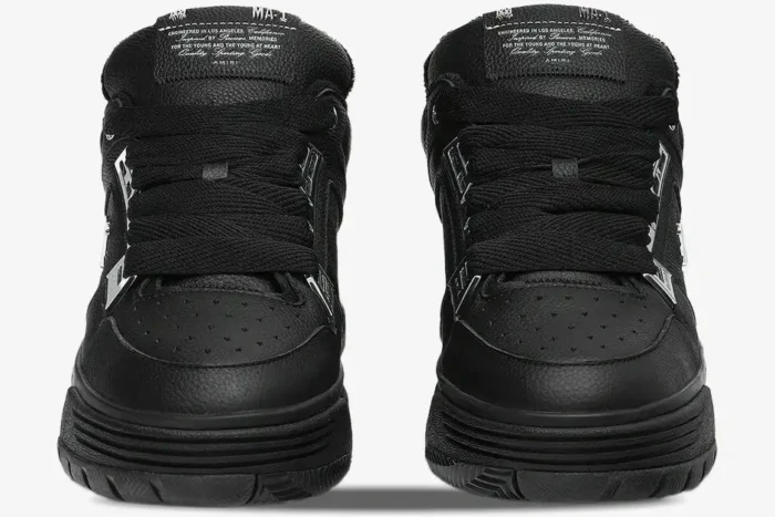 Front view of black metallic Amiri MA-1 leather sneakers featuring thick laces and chunky soles. - SKU AMFOSR1152-001