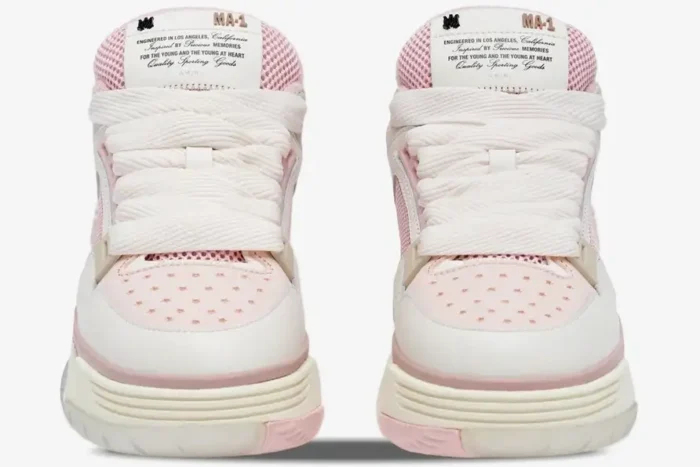 Front view of Amiri MA-1 sneakers in pink, alabaster, and white with chunky laces. - SKU AWFOSR1080-628
