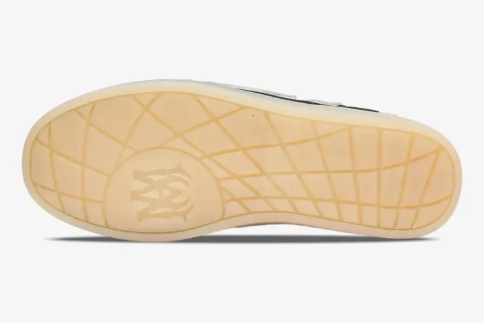Bottom view of the Amiri Pacific Bones sneaker featuring a gum rubber outsole with a grid pattern and monogram logo. - SKU amfosr1102-001