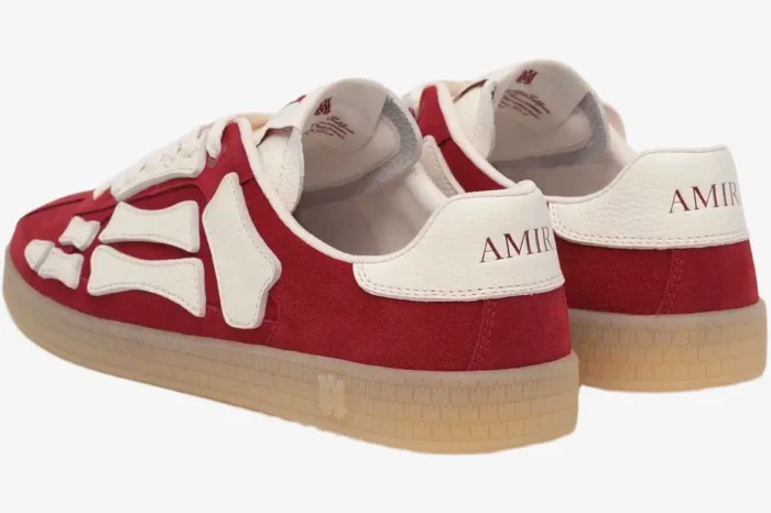 Amiri Pacific Skeleton Bone sneakers in red and white, showing the rear three-quarter view and heel logo. - SKU AMFOSR1135-644