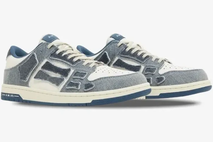Amiri Skel Top Low sneakers in blue denim and white leather, side three-quarter view. - SKU pf23mfs007-533