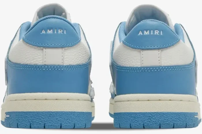 Rear view of white and blue Amiri Skel Top Low sneakers showing the branded heel tabs. - SKU MFS003-462