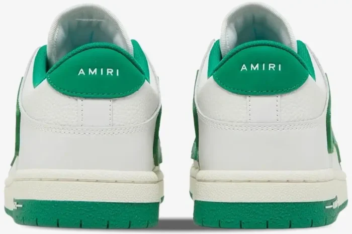 Rear view of Amiri Skel Top Low sneakers in white and green with branded heel tabs. - SKU MFS003-114