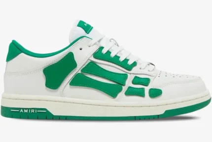 Side profile of Amiri Skel Top Low sneakers in white and green featuring skeleton-inspired leather patches. - SKU MFS003-114