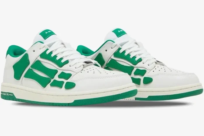 Amiri Skel Top Low sneakers in white and green with skeleton bone overlays, three-quarter view. - SKU MFS003-114