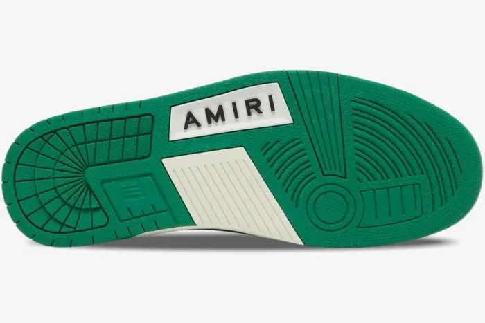 Bottom view of the green and white sole of an Amiri Skel Top Low sneaker featuring the brand logo. - SKU MFS003-114