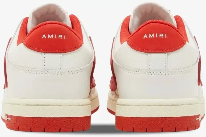 Rear view of Amiri Skel Top Low sneakers in white and red leather with branded heel tabs. - SKU mfs003-124