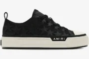 Amiri Stars Court black leather sneakers with star patches, side profile view on white platform sole. - SKU AMFOSR1178-083