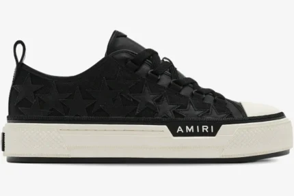 Amiri Stars Court black leather sneakers with star patches, side profile view on white platform sole. - SKU AMFOSR1178-083
