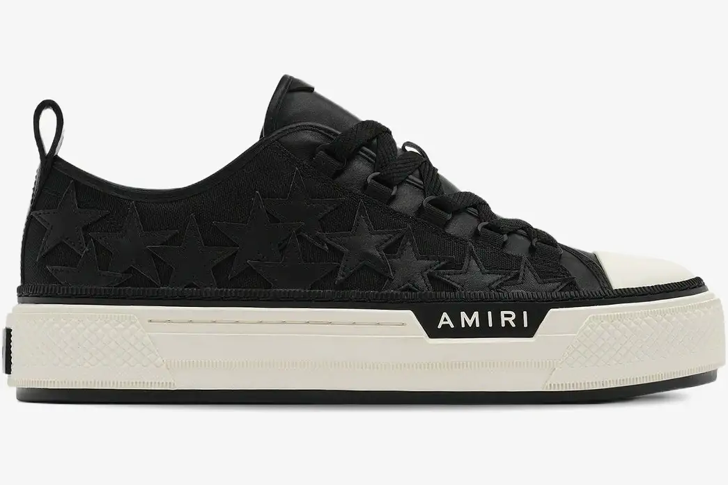 amiri-stars-court-black-leather-side-view-amfosr1178-083-965-236 Amiri Stars Court black leather sneakers with star patches, side profile view on white platform sole. - SKU AMFOSR1178-083