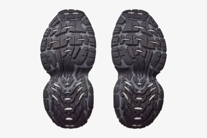 Bottom view of Balenciaga 10XL Sneaker outsoles in grey and black with silver accents. - SKU 815859W2MV21012