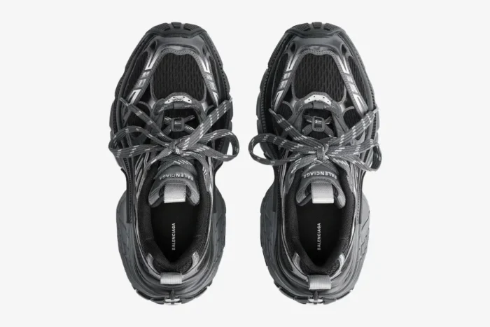 Top-down view of Balenciaga 10XL sneakers in grey, black, and silver with chunky soles and patterned laces. - SKU 815859W2MV21012