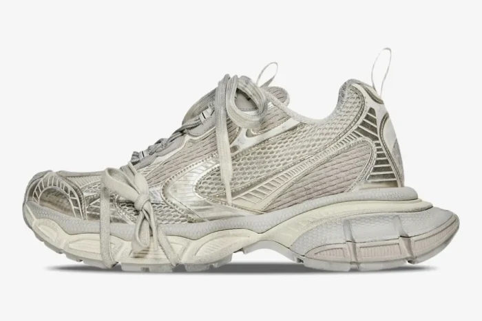 Balenciaga 3XL sneaker in distressed beige mesh, side profile view on a white background. - SKU 734734W3XL49191